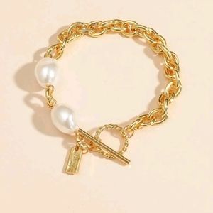 Arm candy pearl and gold bracelets